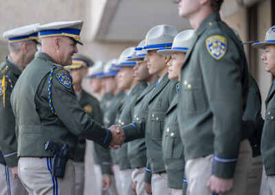 CHP commissioner conducts final inspection before graduation.